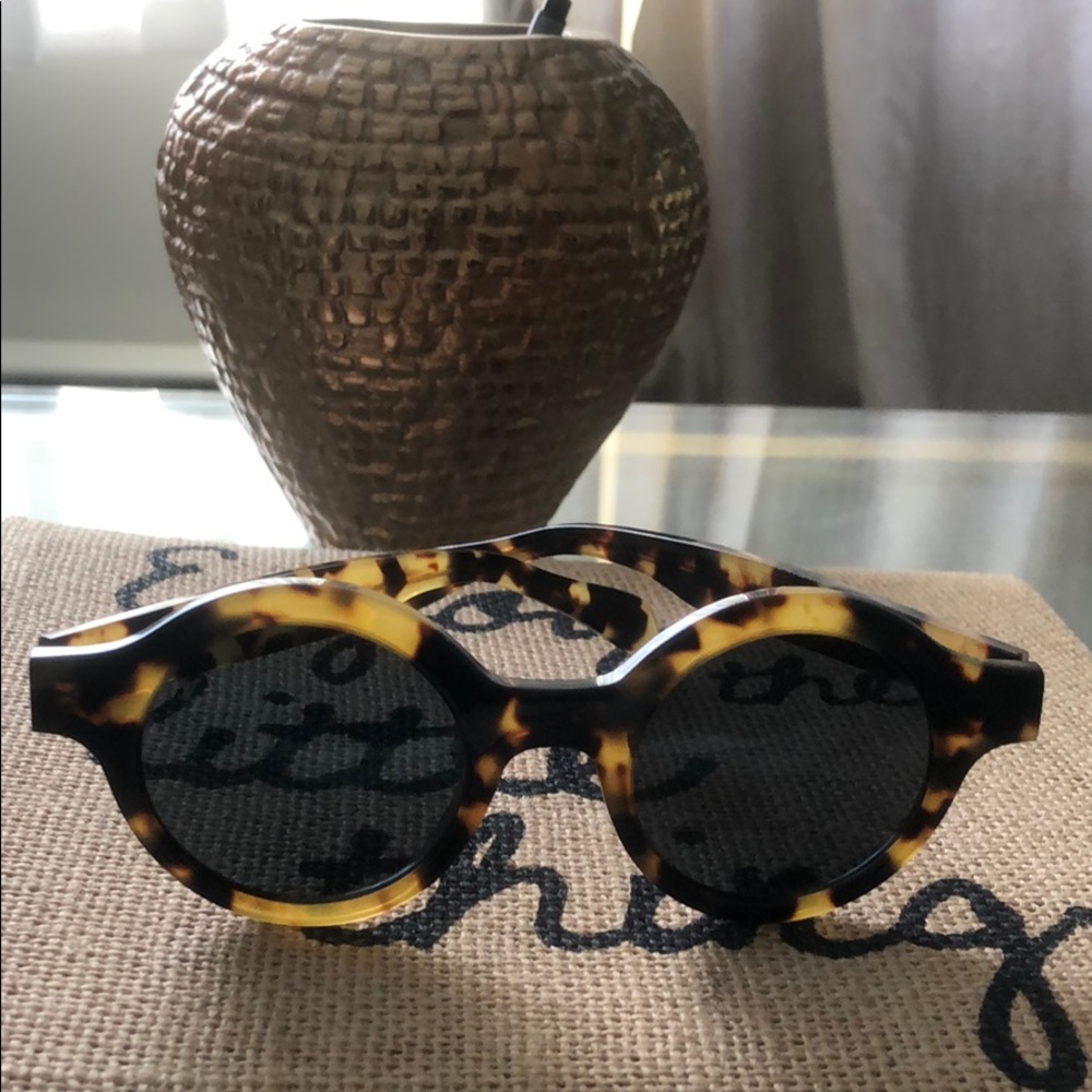 Authentic Louis Vuitton supreme x brown glasses .